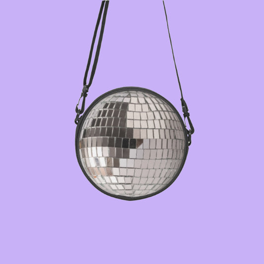 Add some disco flair to your look with our Disco Ball Round Satchel Bags. Crafted from sturdy canvas, this one-of-a-kind bag has a retractable shoulder strap and a surprisingly roomy 9 inch diameter. Perfect for daily use, it's sure to add a fun and stylish touch to carrying your essentials!